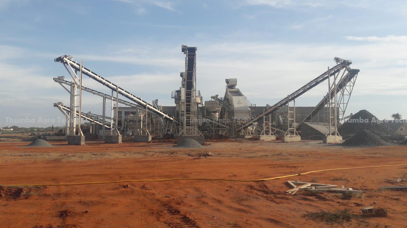 Stone crusher plant in the Madurai region with Thumba machine side dust control during blue metal crushing